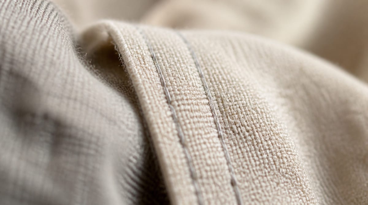 Close-up of woven fabric and stitching